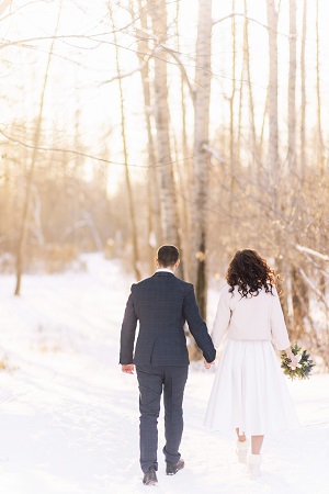 Couple in snowy forest